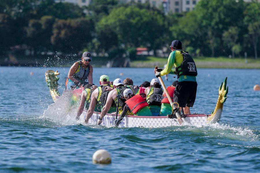 Austcham crew racing at the Singapore Dragonboat Festival, Seniors category