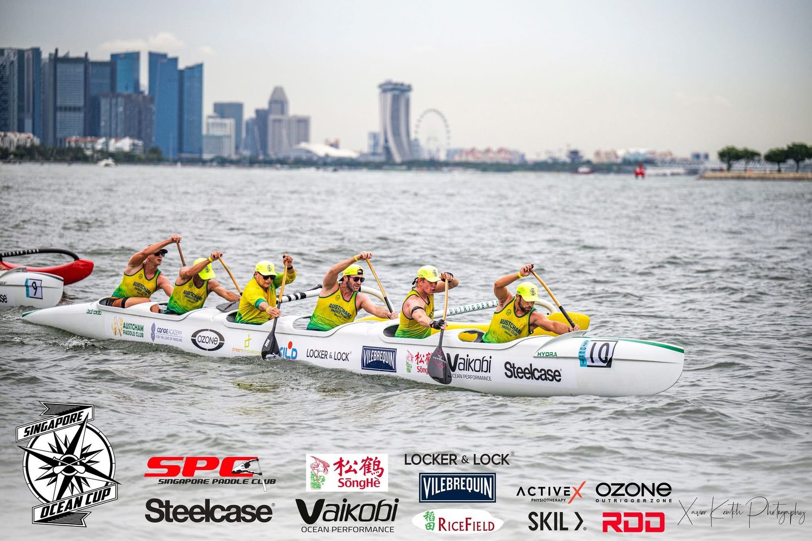 Austcham outrigger canoe crew racing at the Singapore Ocean Cup